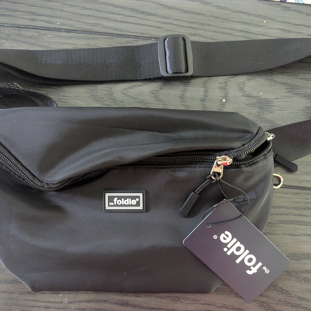 Black Crossbody Bag with Adjustable Strap and Flap Closure